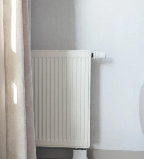 heating-radiator-under-window-in-the-room